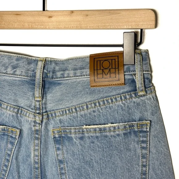 TOTEME Size 26 Barrel Leg Light Wash Button‎ Fly Jeans Raw Hem